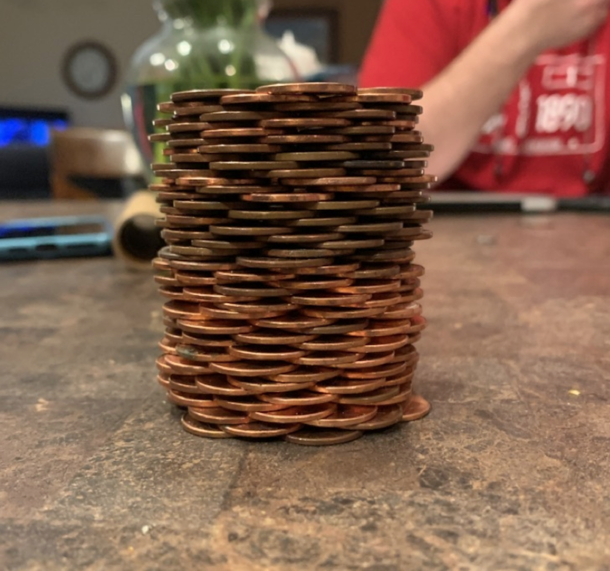 A stack of pennies on a table