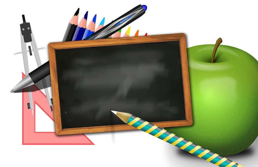 Chalkboard and school supplies
