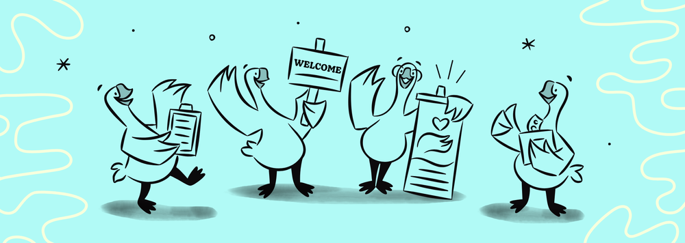 Four geese waving. Two are holding clipboards and two are holding "welcome" signs.